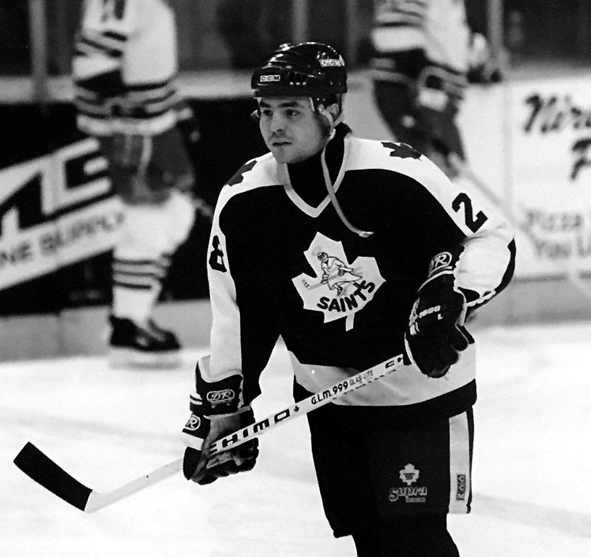 John Kordic, NHL enforcer, in a black-and-white fight photo