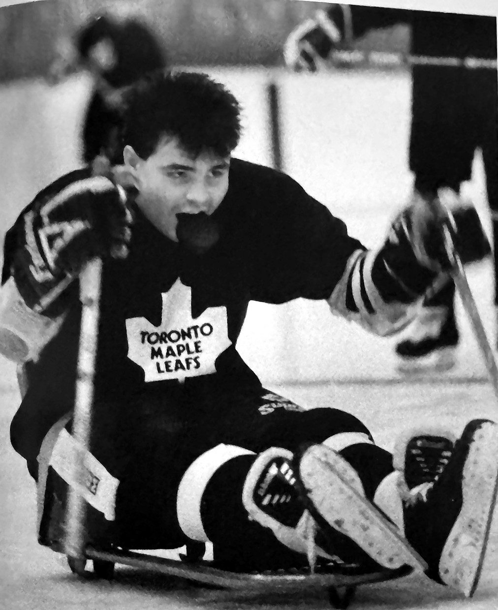 John Kordic playing sledge hockey for a Toronto rehabilitation centre, 1990